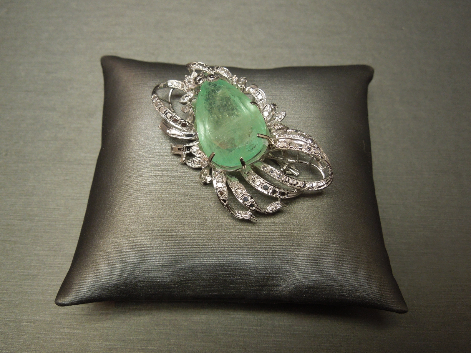 large emerald brooch